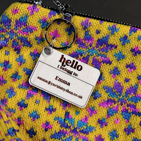 'I belong to:' bag tag