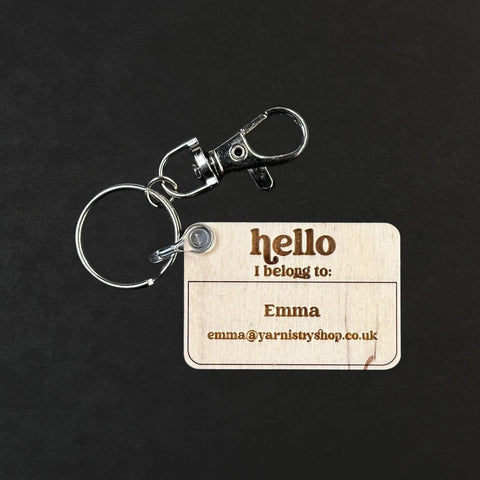 'I belong to:' bag tag