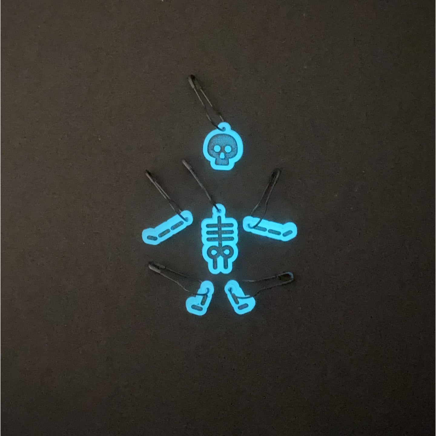 Glow in the dark skeleton stitch markers